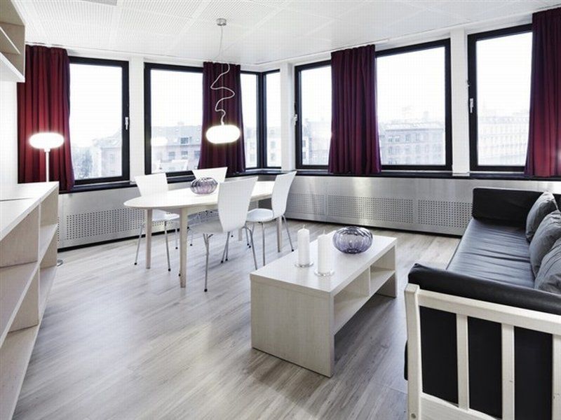 Manon Les Suites Guldsmeden Copenhaga Exterior foto Interior of a serviced apartment in Berlin, Germany